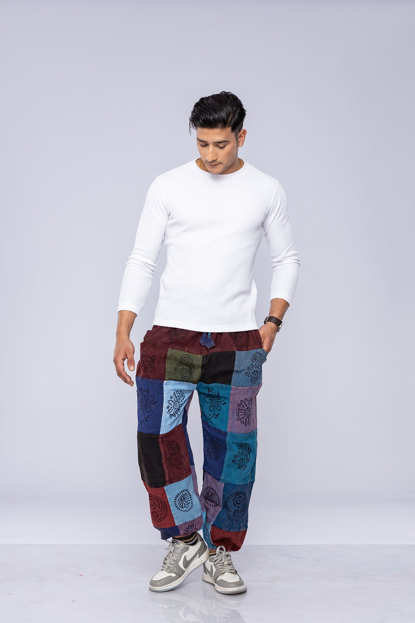 Man wearing patchwork harem pants