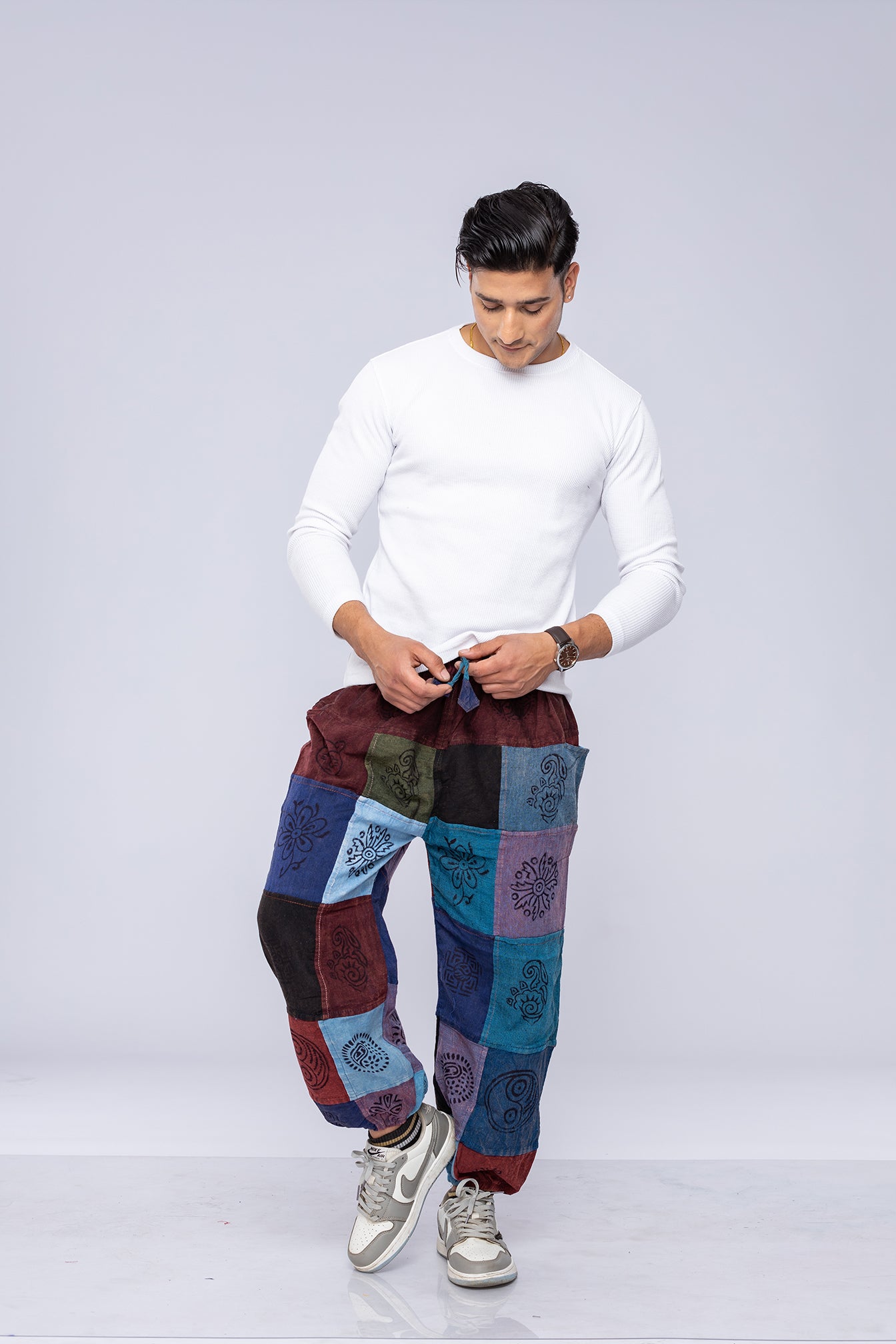 Man wearing patchwork harem pants