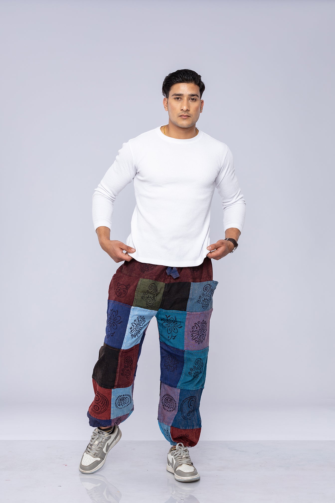 Man wearing patchwork harem pants