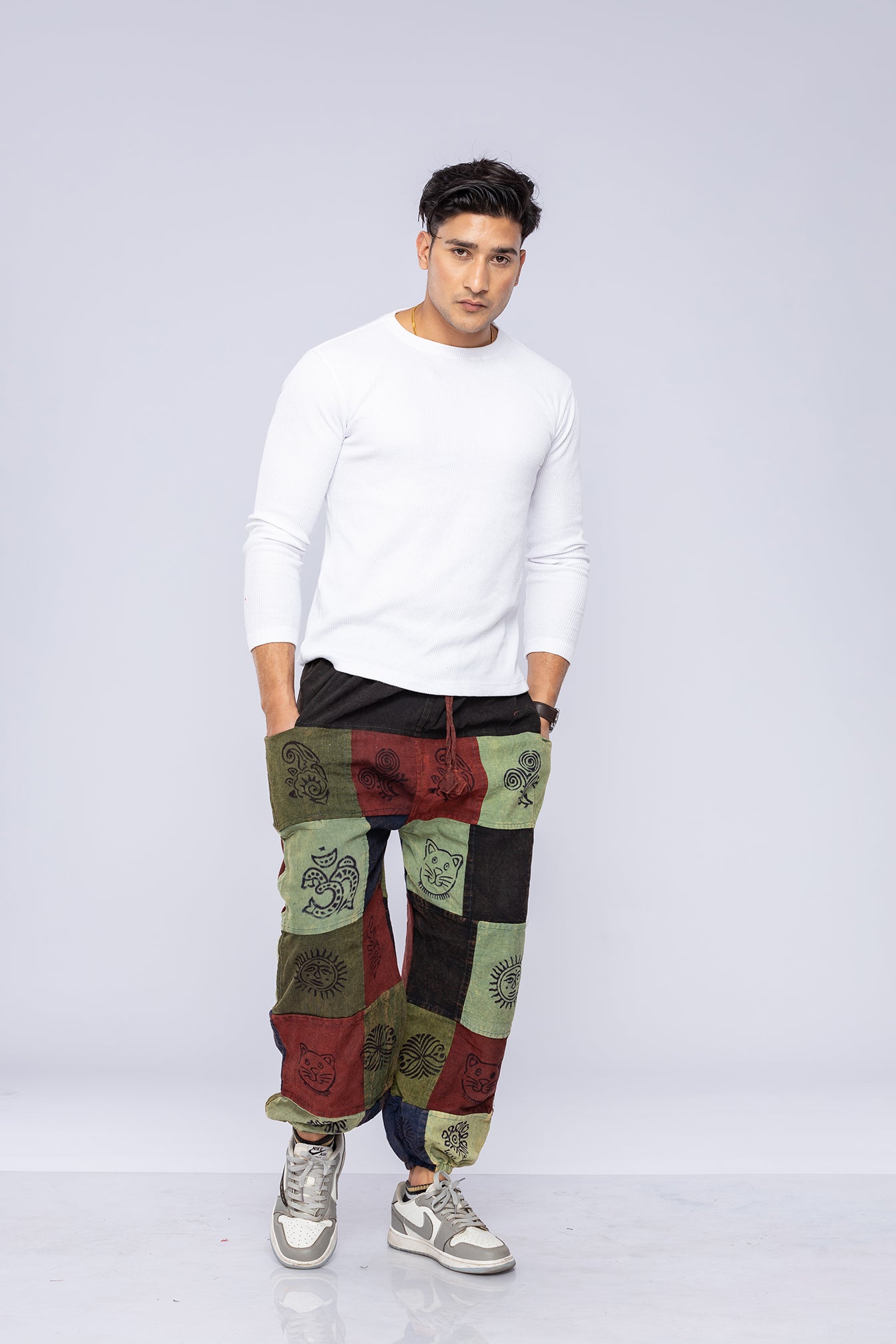 Man wearing patchwork harem pants