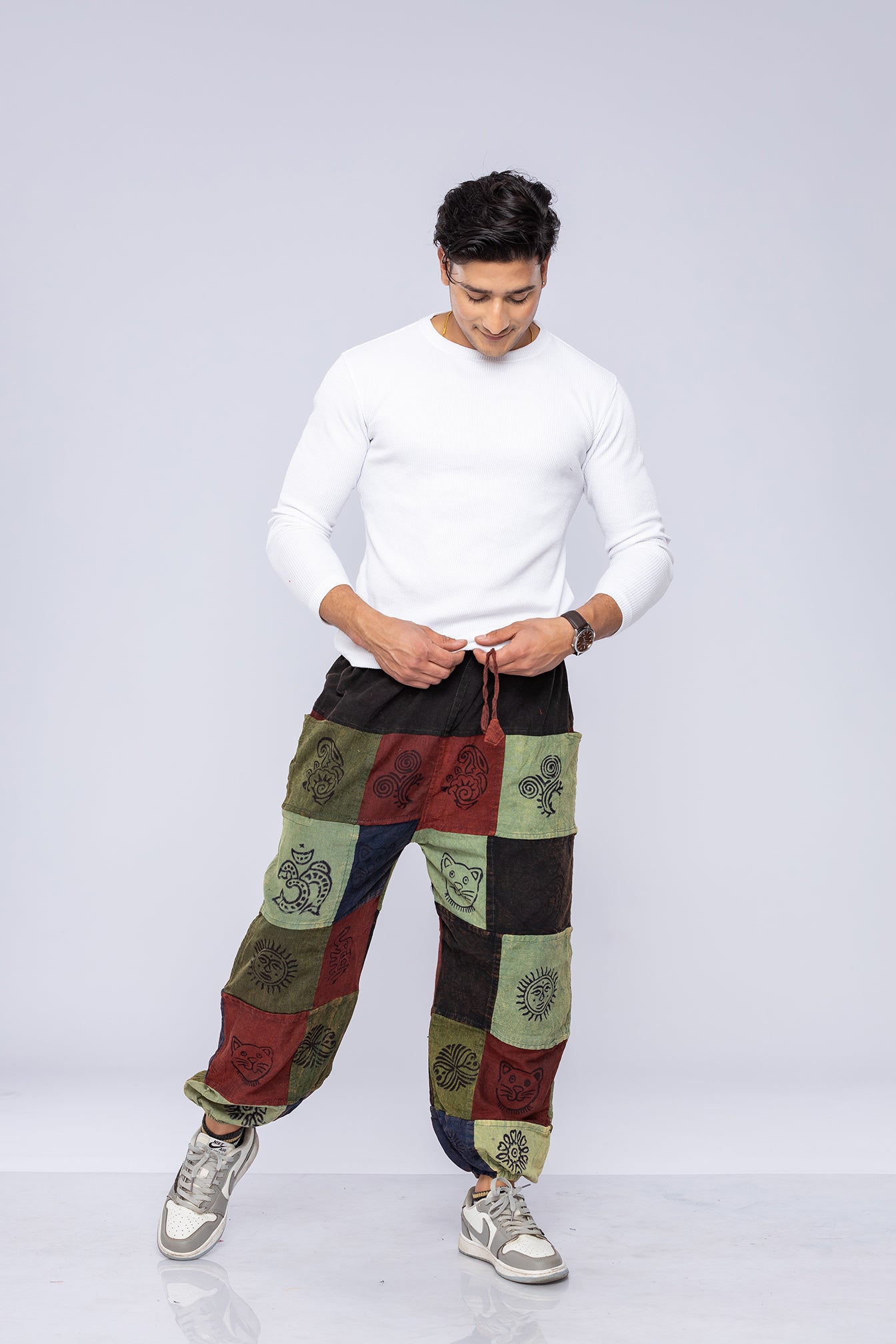 Man wearing patchwork harem pants