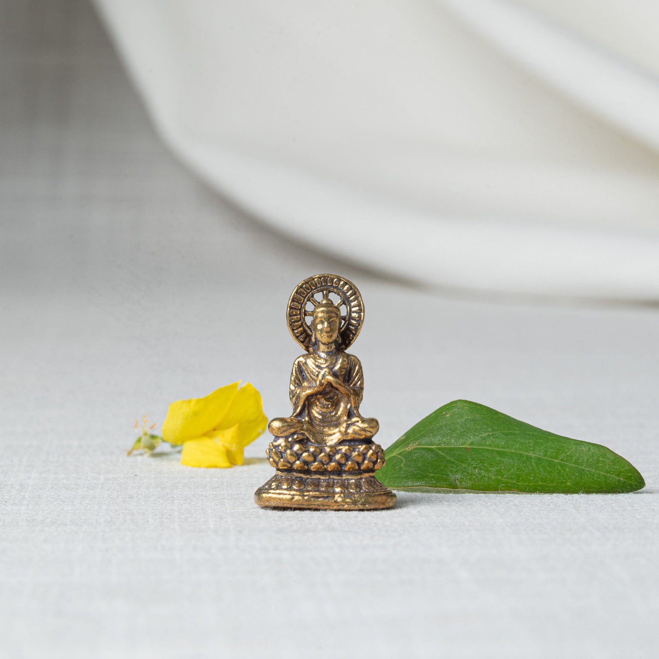 little brass buddha statue