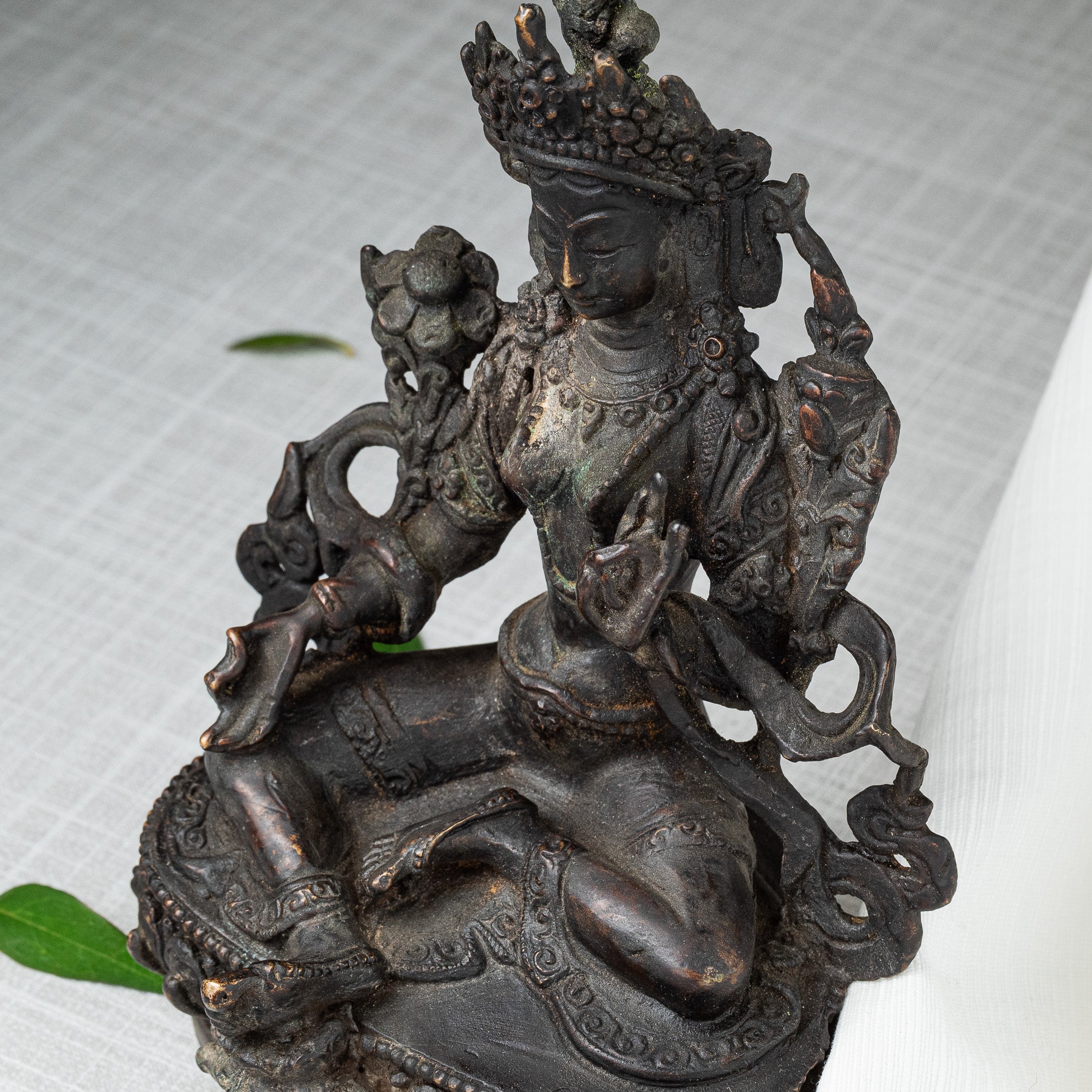 Close view of Green Tara statue