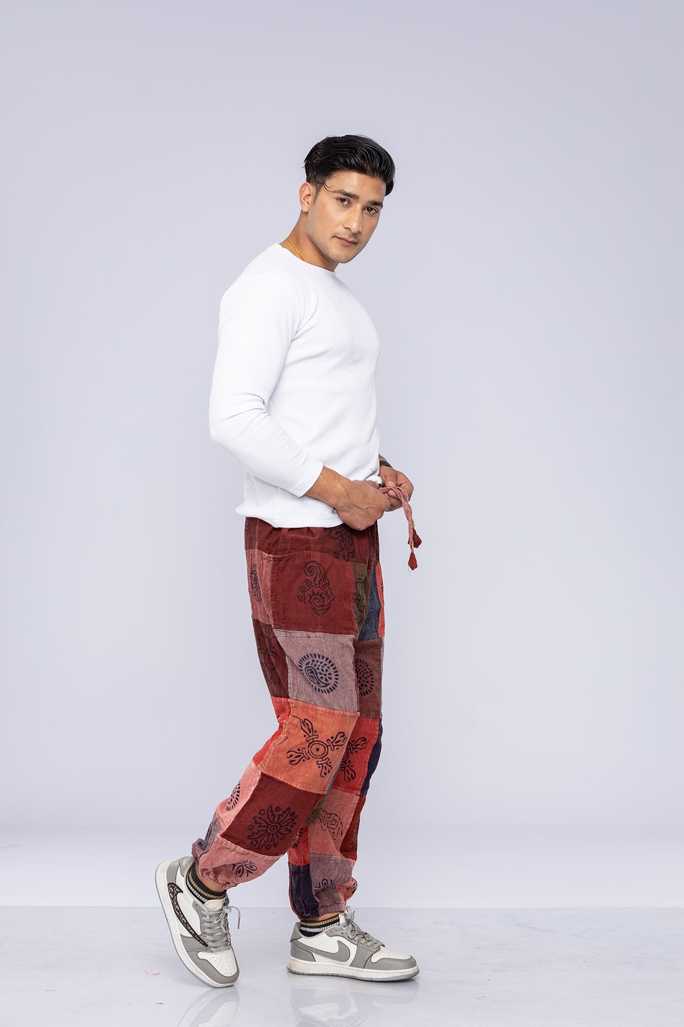 Man wearing patchwork harem pants
