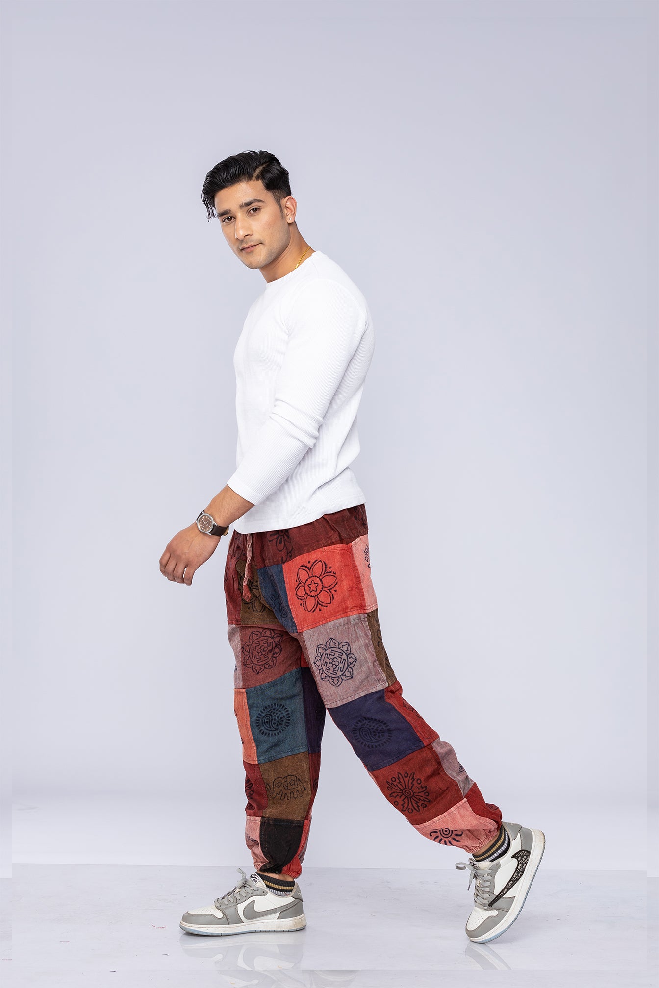 Man wearing patchwork harem pants