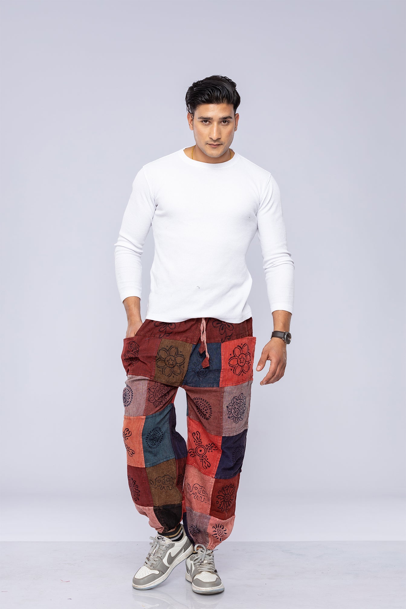 Man wearing patchwork harem pants