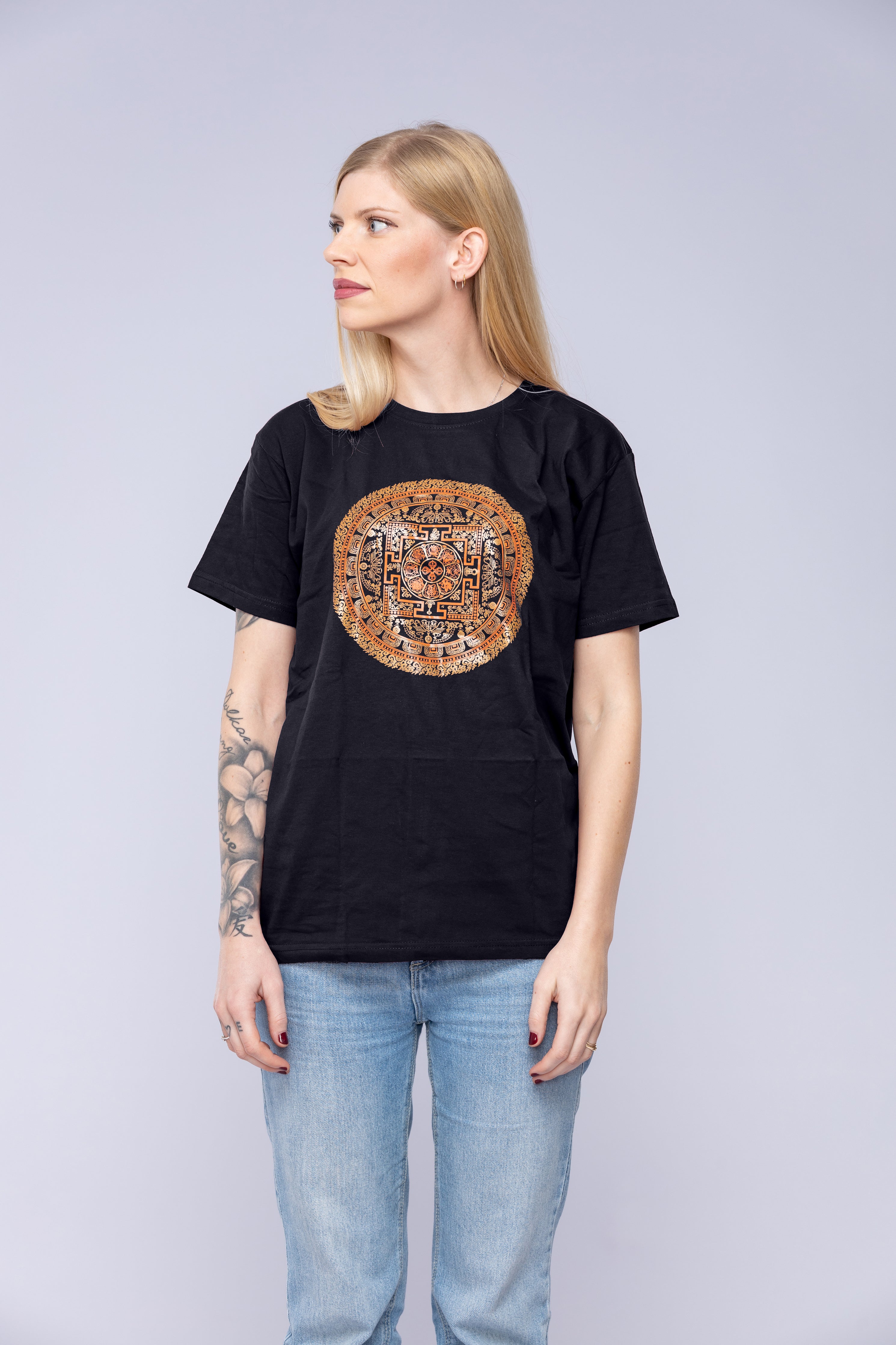 Woman wearing black Vajra mandala t-shirt