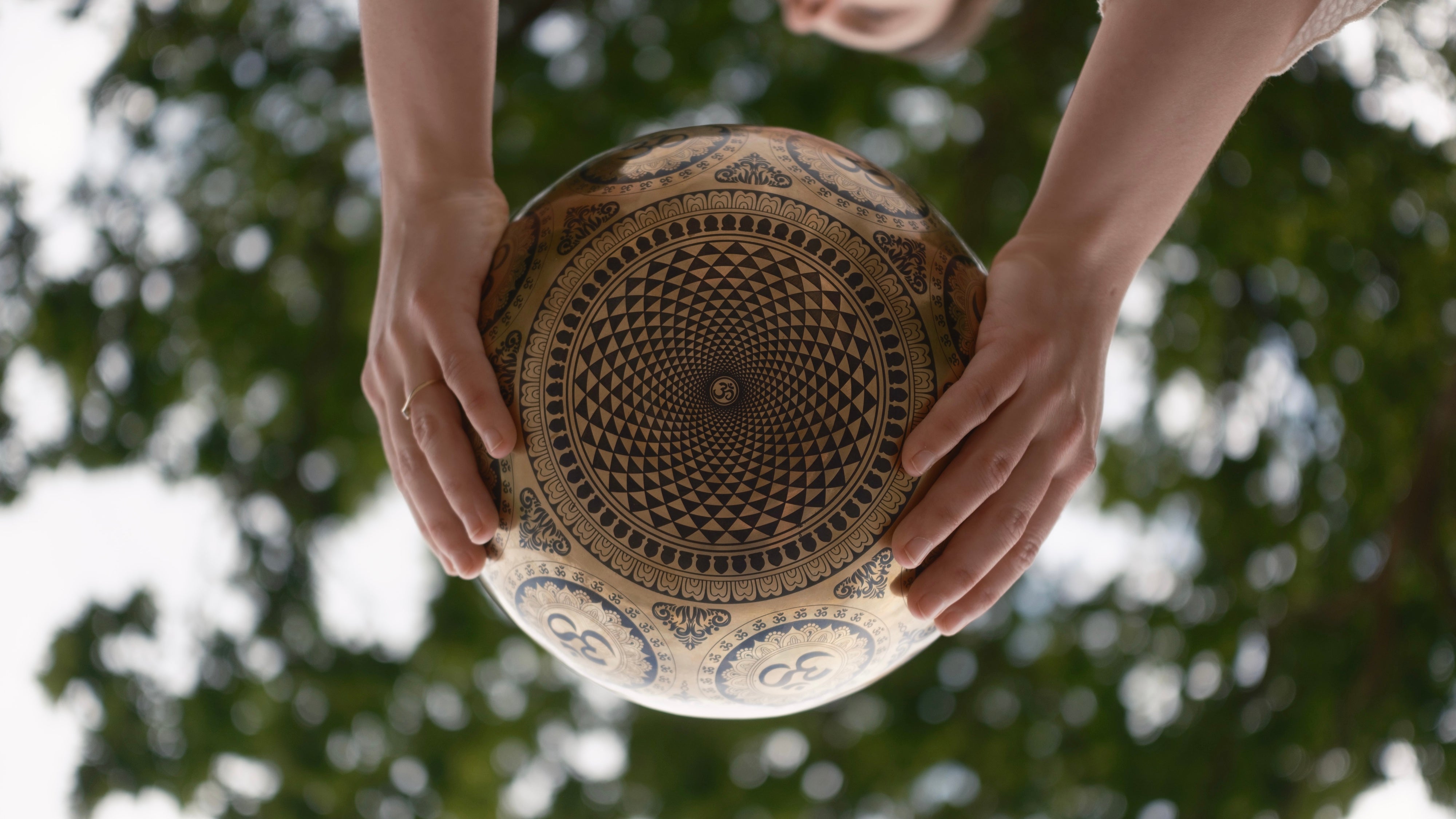 singing bowl sitting upon a cushion in a wooden space
