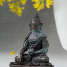 Nærbillede af Bhumiparsha Mudra Buddha figur