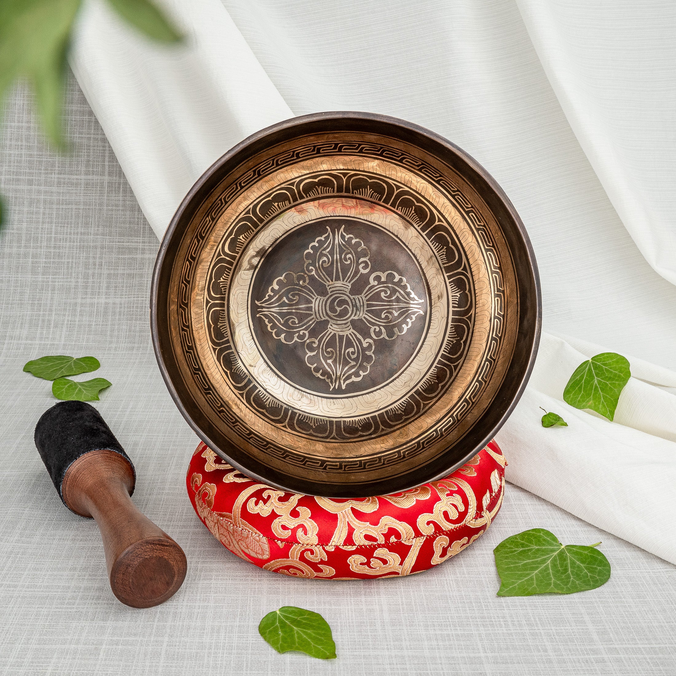 Inside of crossed vajra singing bowl with beautiful inscription 