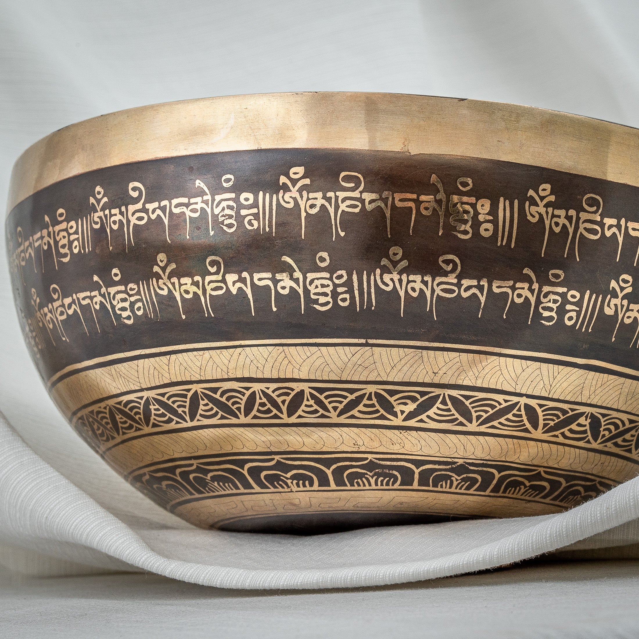 Detailed shot of outer walls of crossed vajra singing bowl