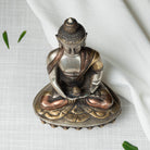 Set ovenfra af Buddhafigur