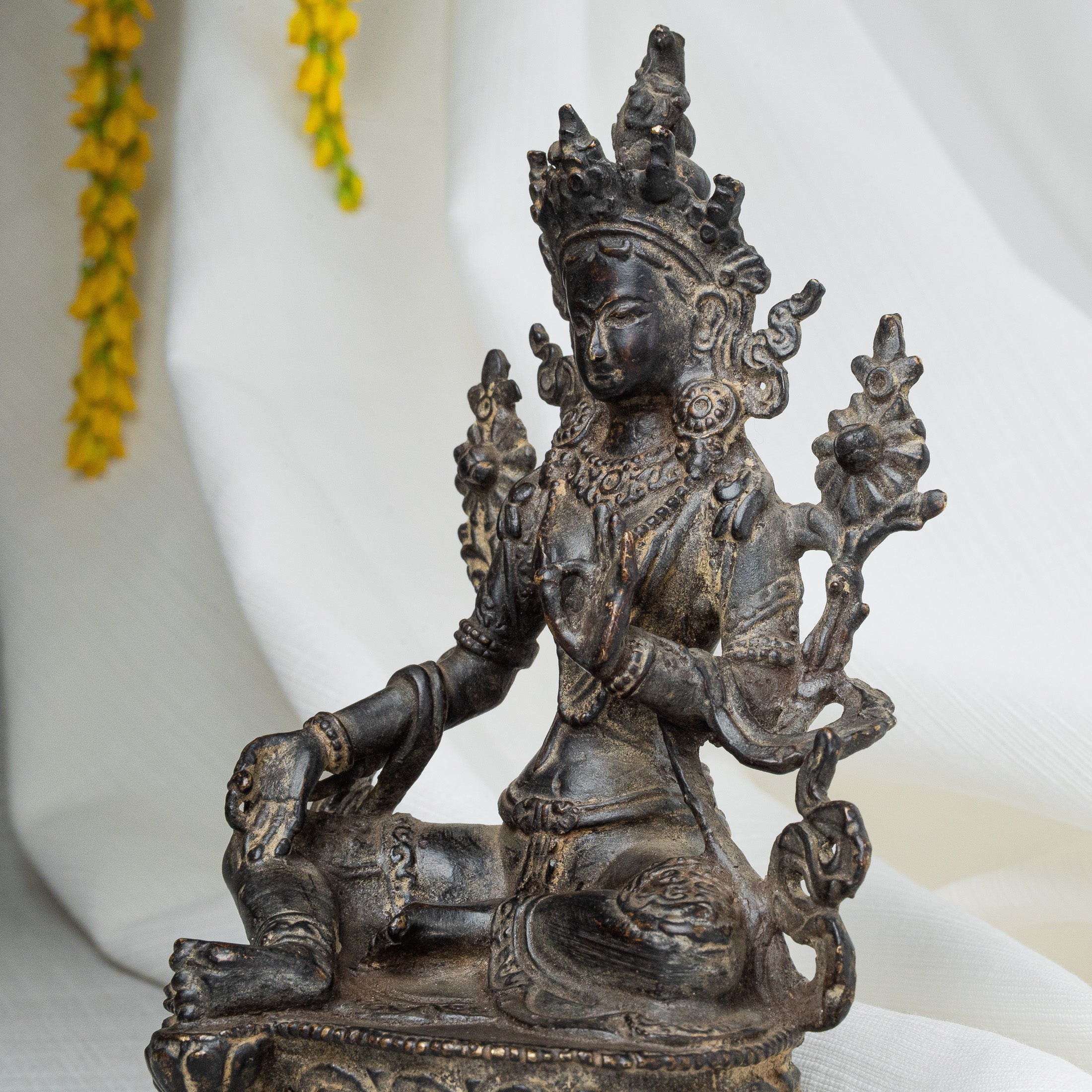 Close view of Green Tara statue